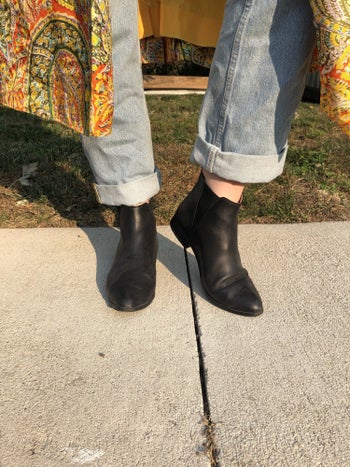 a close up of the chelsea boots in black