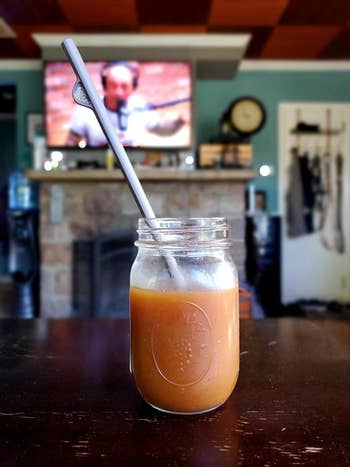 Reviewer’s straw is shown in a cup of iced coffee