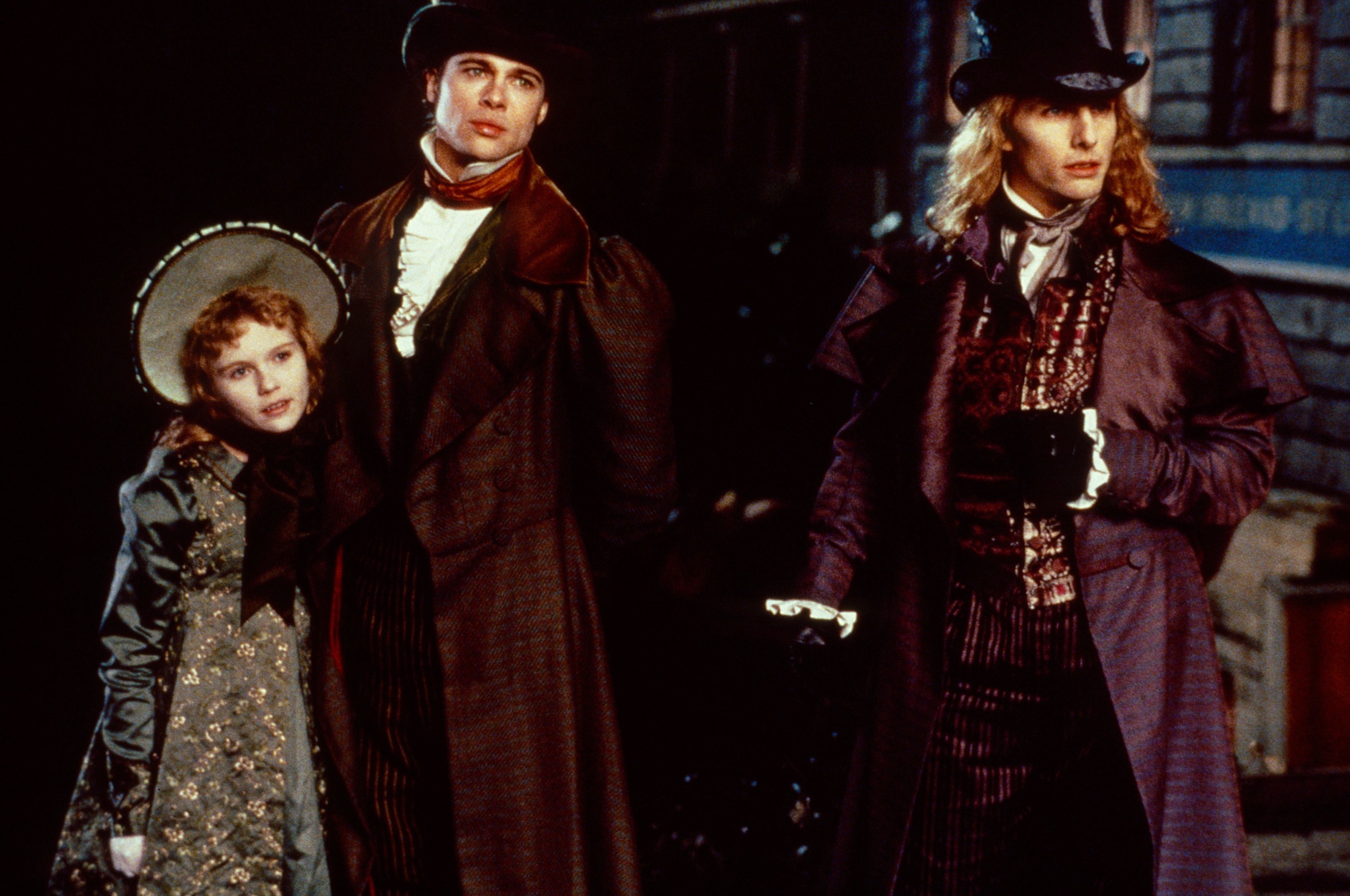 Kirsten Dunst, Brad Pitt, and Tom Cruise in 19th century era clothing