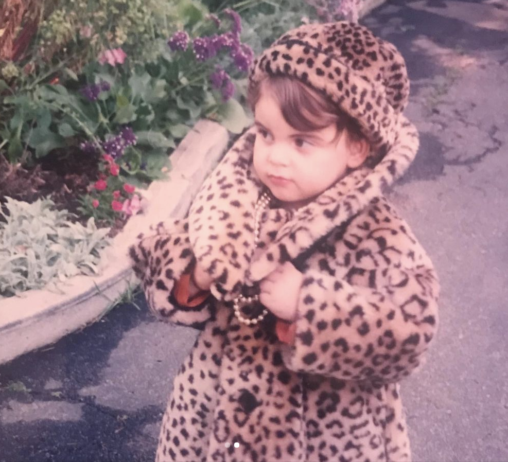 Beanie dressed in all leopard with a pearl necklace