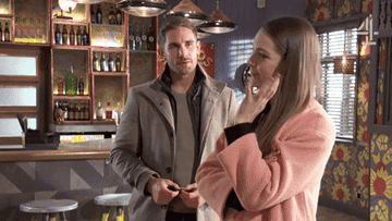 A gif of a person showing off their shiny engagement ring