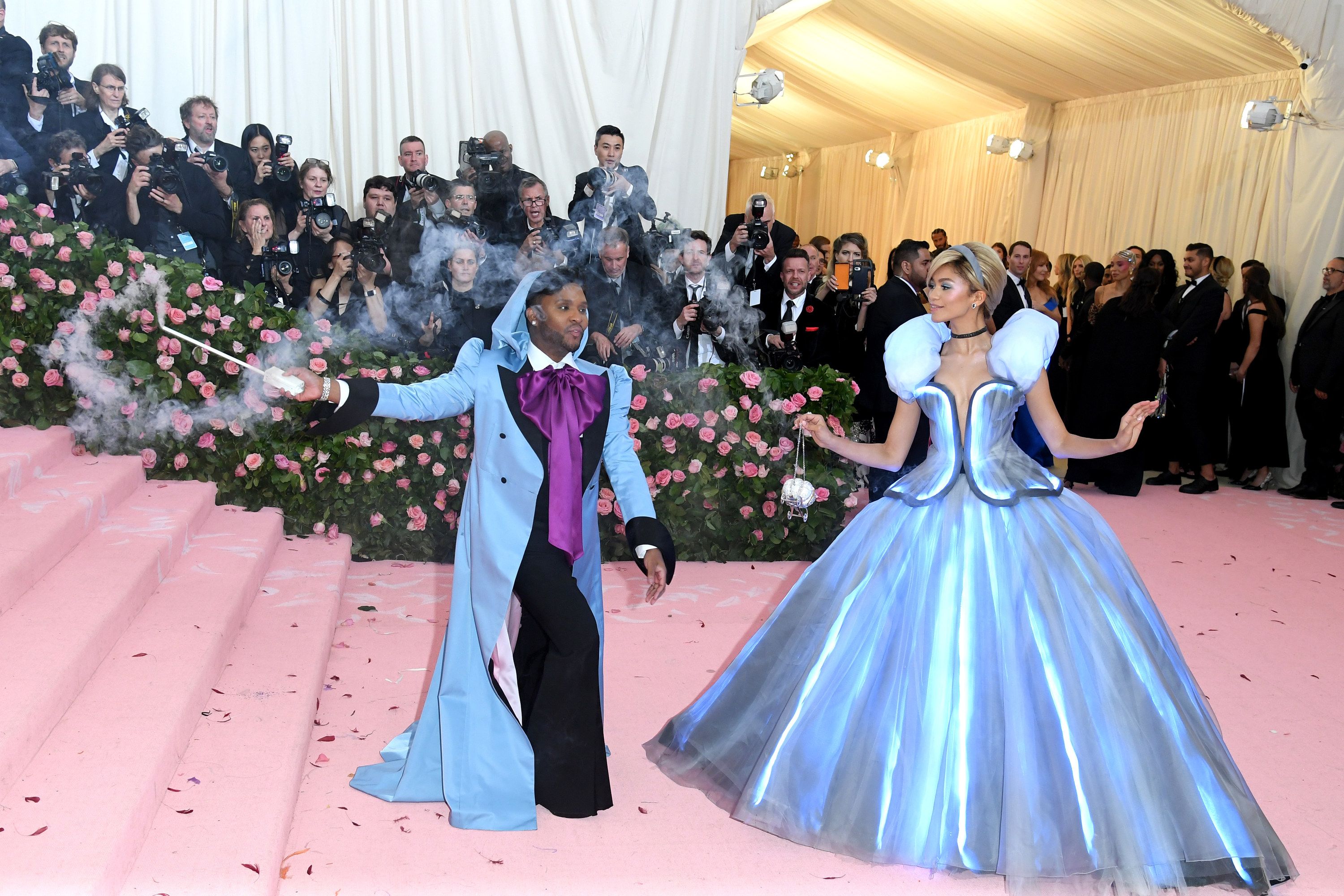 Law waving a smoke-emitting want to turn on the lights built into Zendaya&#x27;s Cinderella ballgown