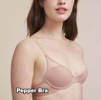 a model wearing a pink Pepper bra with no cup gapping visible