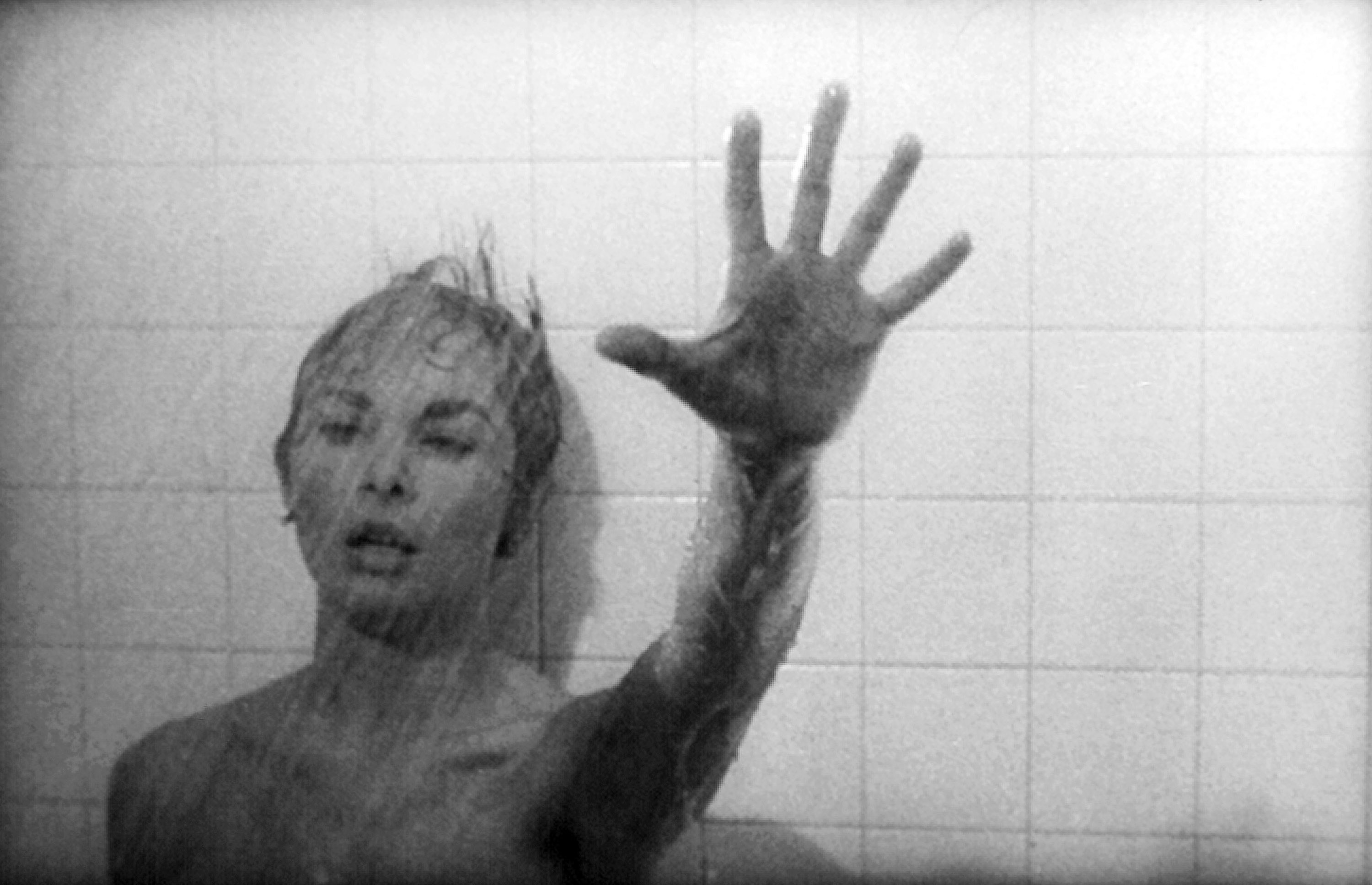 Leigh as Marion in the shower dying