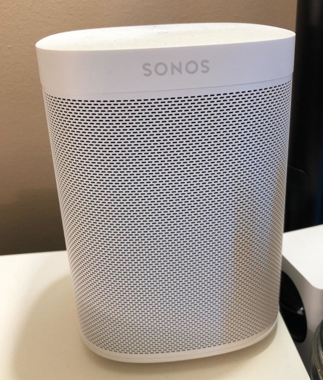 Reviewer photo of the white speaker