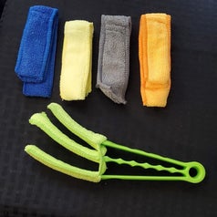 Reviewer photo of the duster brush and five reusable cloths