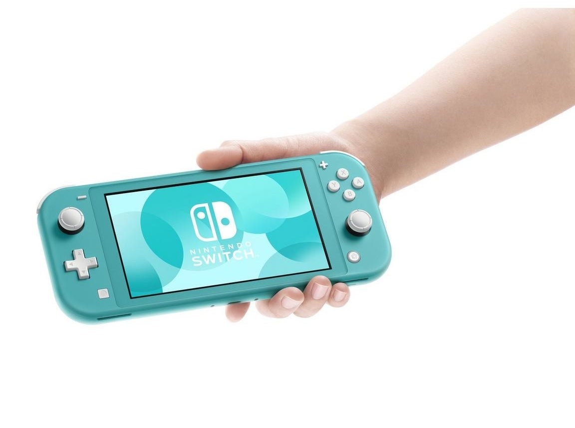 Hand holding turquoise Nintendo Switch Lite