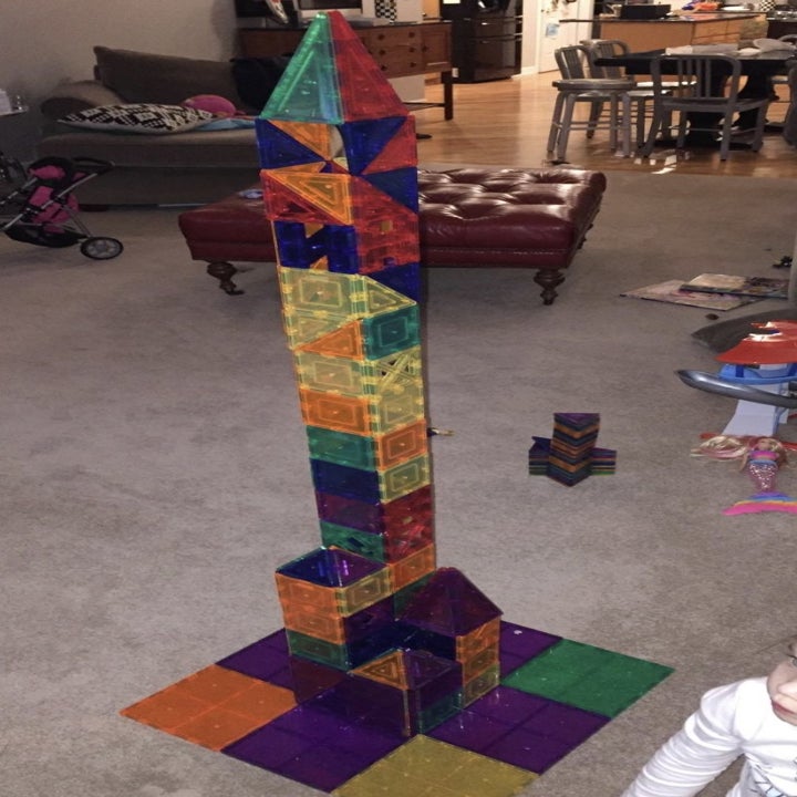 a tower made out of the magnetic tiles