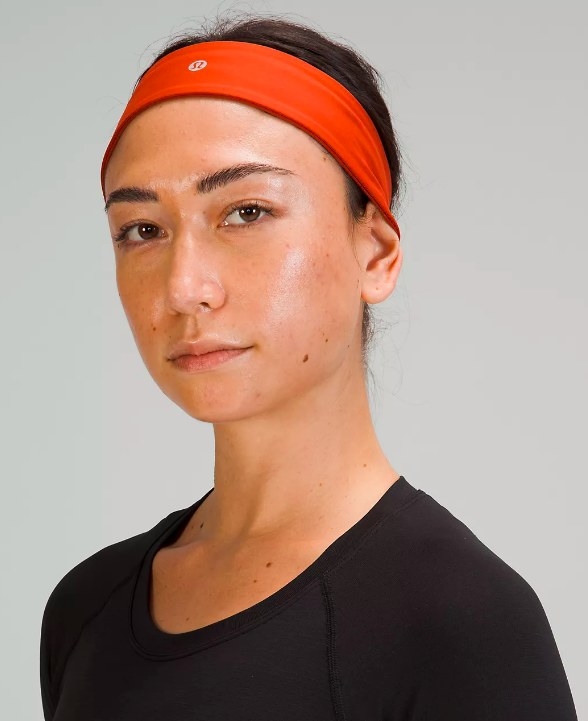 Model wearing the red headband
