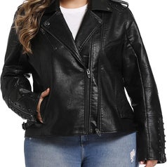 The faux leather jacket in black with zippers on each sleeve and button snaps on each shoulder.