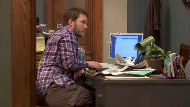 Andy looking at his computer in &quot;Parks and Recreation&quot;