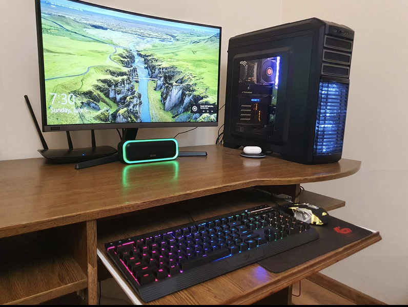 gaming desk with the monitor set up on it