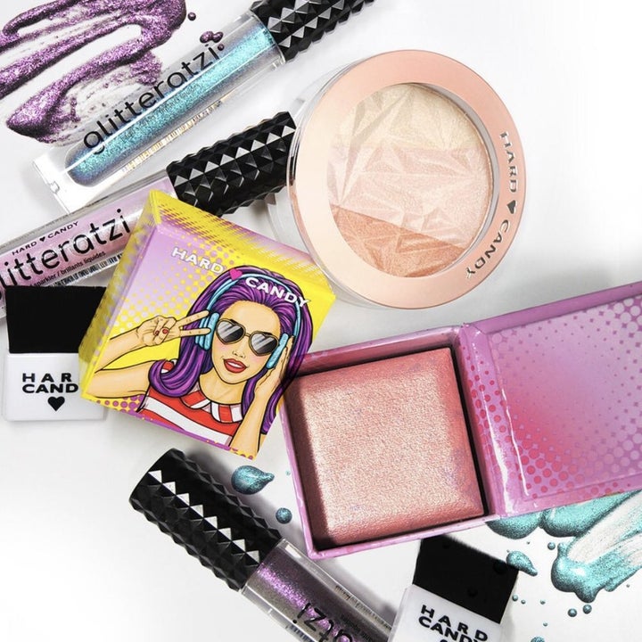 A set of lip glosses and highlighter compacts