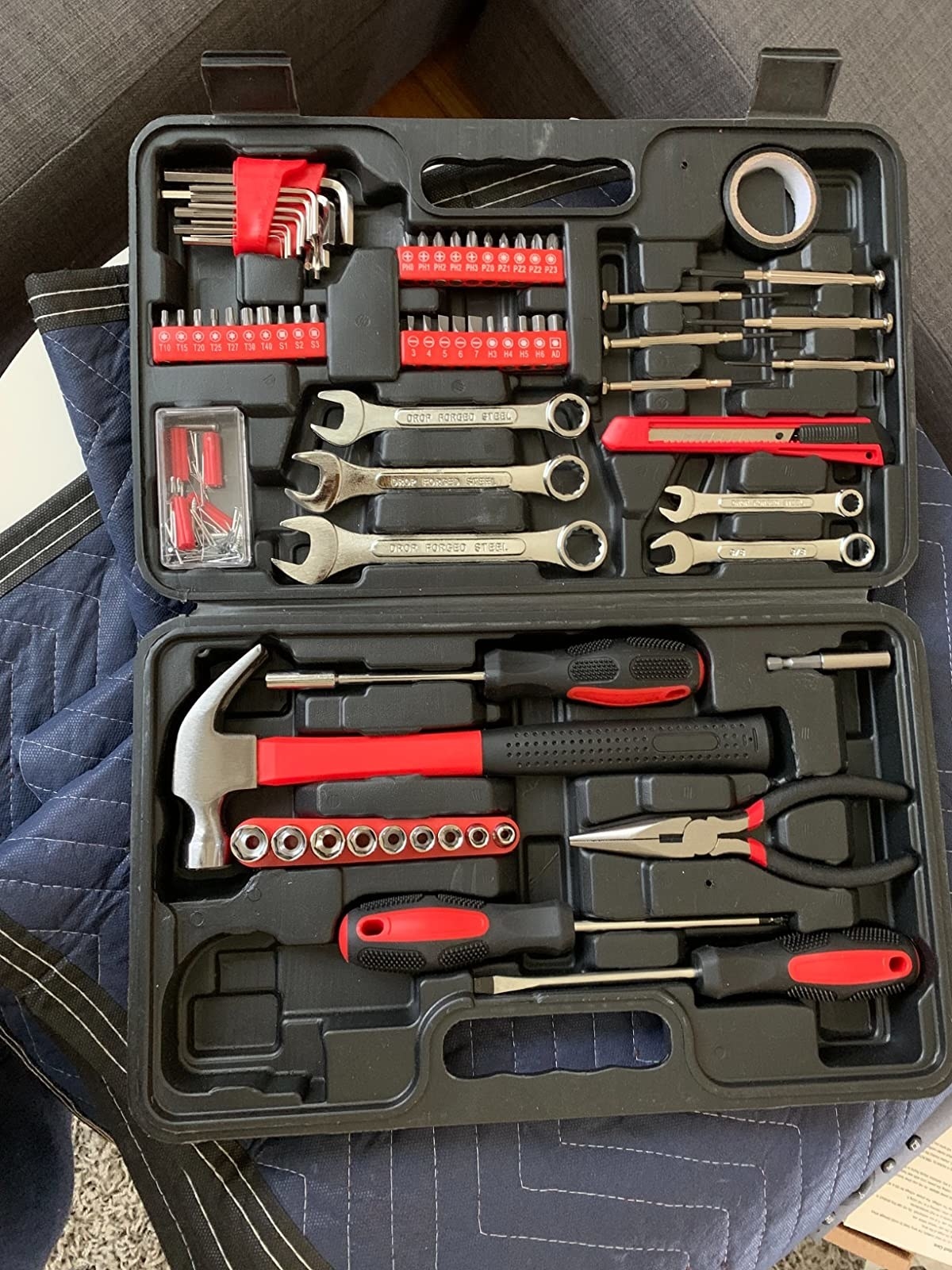 the full tool kit open with hammer, screwdrivers, wrenches, and bolt tighteners