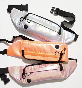 the fanny packs in metallic coral, pink, and silver