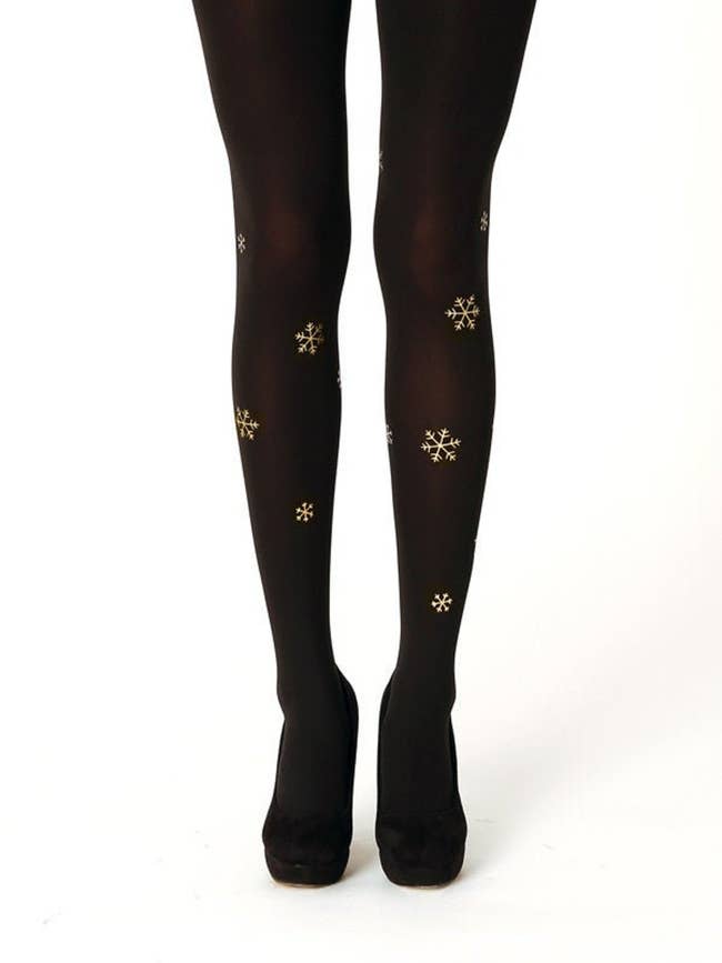 black tights with gold snowflakes on them