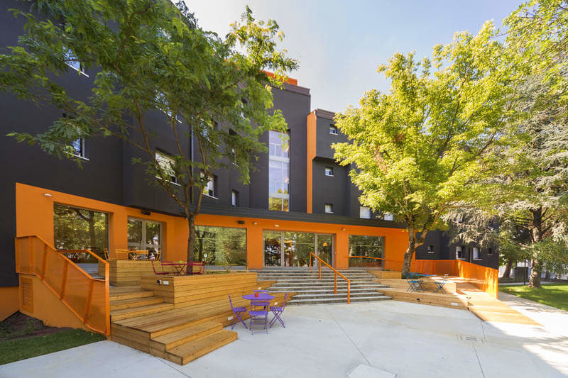 Large outdoor steps and patio to hang out at the Combo Bologna hostel