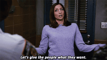 gina linetti in brooklyn nine nine saying &quot;let&#x27;s give the people what they want&quot; and shrugging