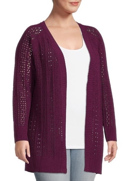 an model wearing the cardigan in an eggplant shade