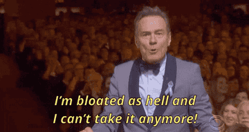 GIF of Bryan Cranston yelling I&#x27;m bloated as hell and I can&#x27;t take it anymore