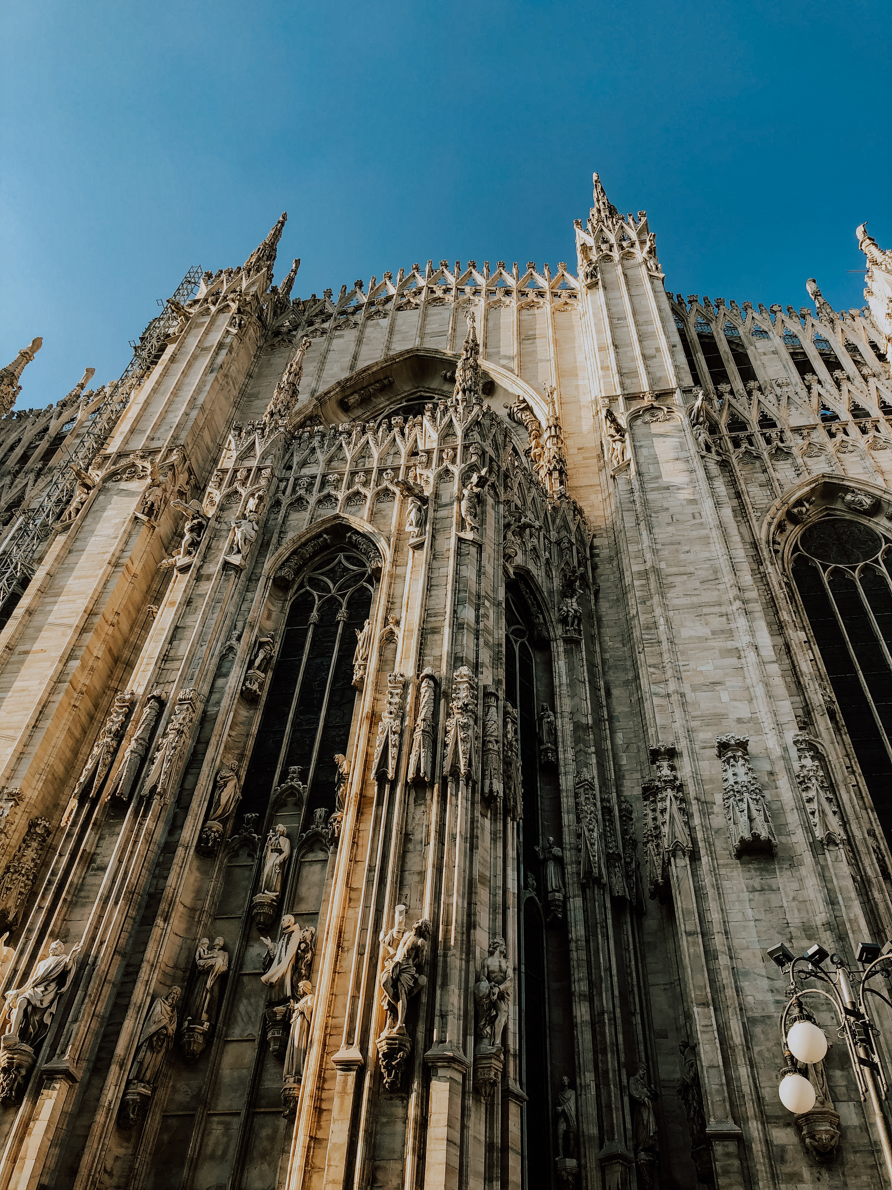 Up close shot of the intricate architecture of Duomo di Milano