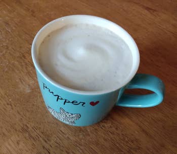 a mug with frothy milk in it