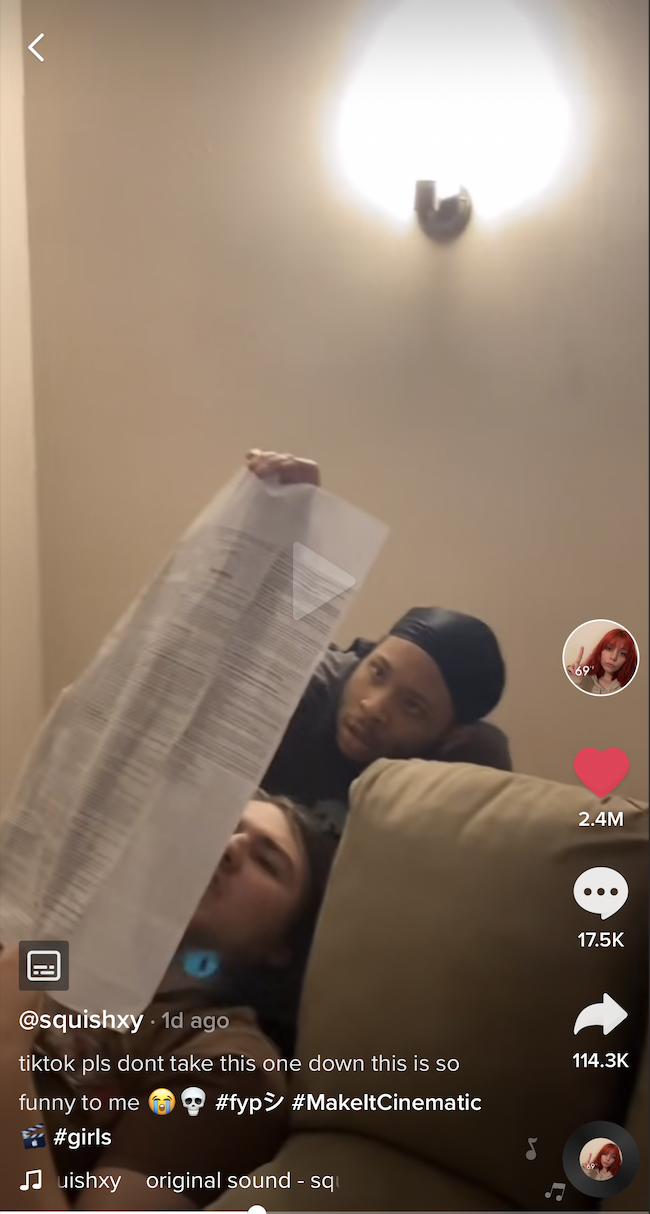 Two men read the side effects sheet from a package of birth control pills