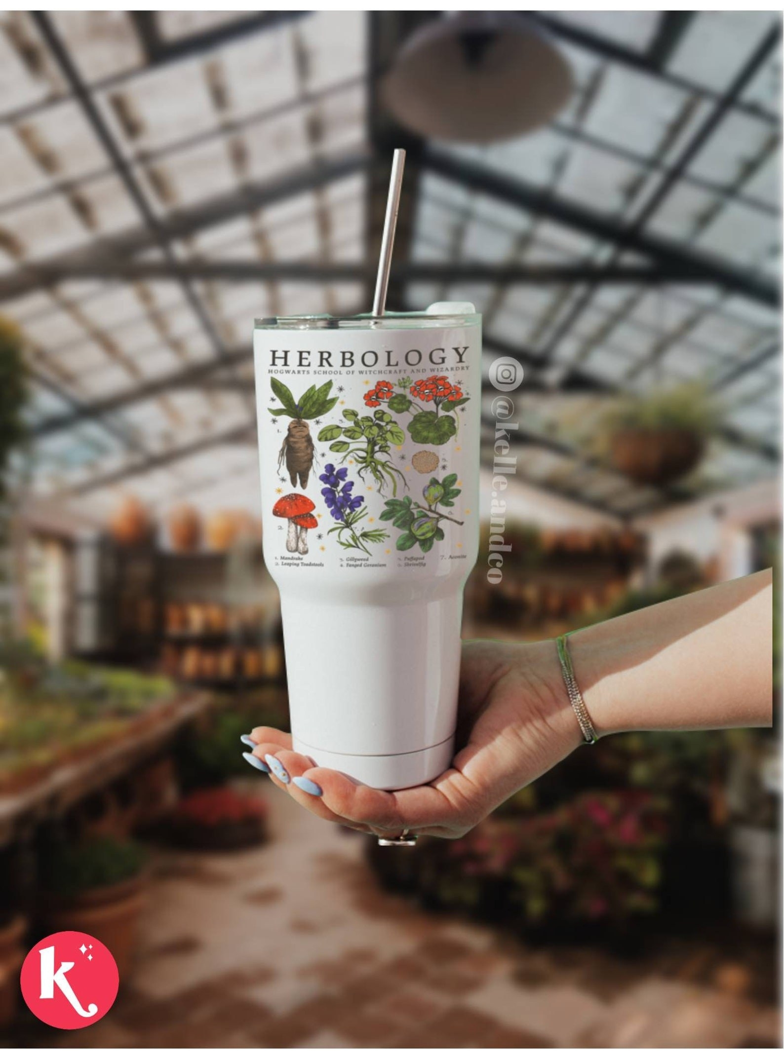 a white tumbler with herbology icons on it