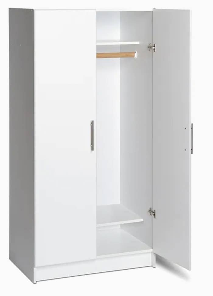 32-inch white armoire with two doors and hanging rack