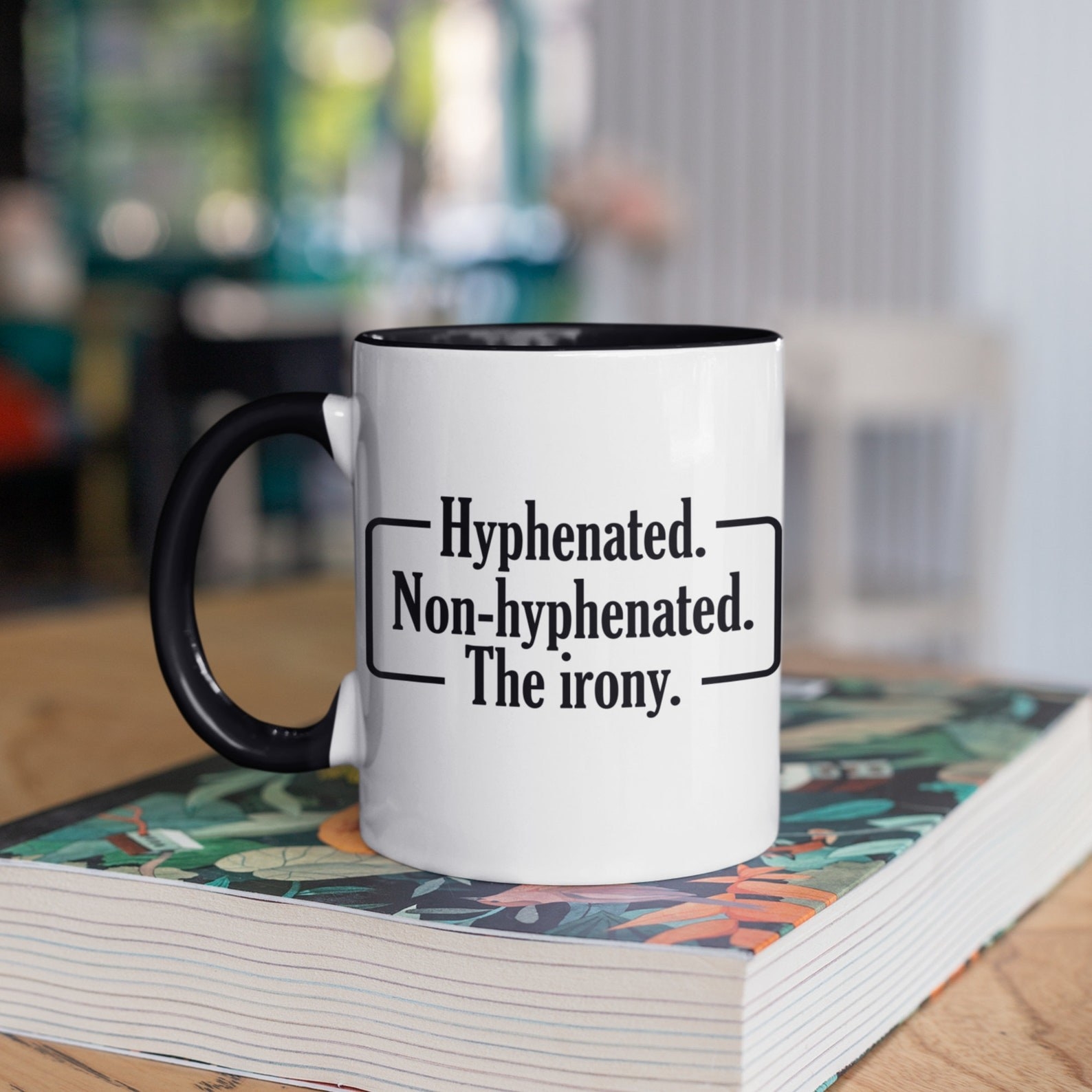 product image of mug with slogan: &quot;Hyphenated. Non-hyphenated. the irony&quot;