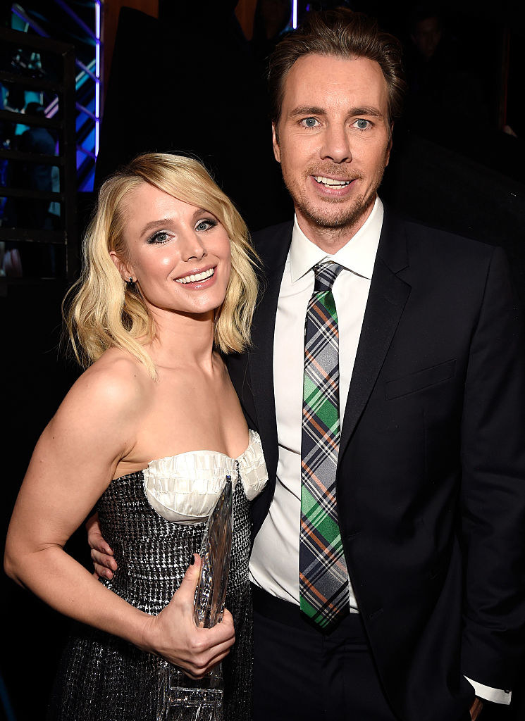 Kristen Bell (L) and Dax Shepard backstage