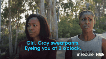 Yvonne Orji as Molly and Issa Rae as Issa spot a shirtless man in grey sweats running towards them in &quot;Insecure&quot;