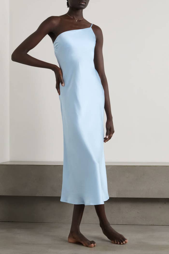 A model wearing the dress in blue