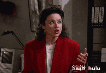 Elaine from &quot;Seinfeld&quot; looking shocked and putting her hand to her mouth