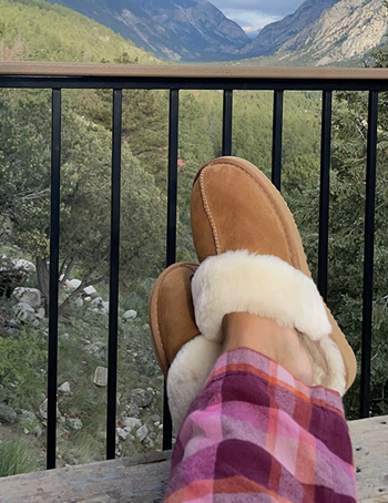 reviewer wearing slippers in chestnut color