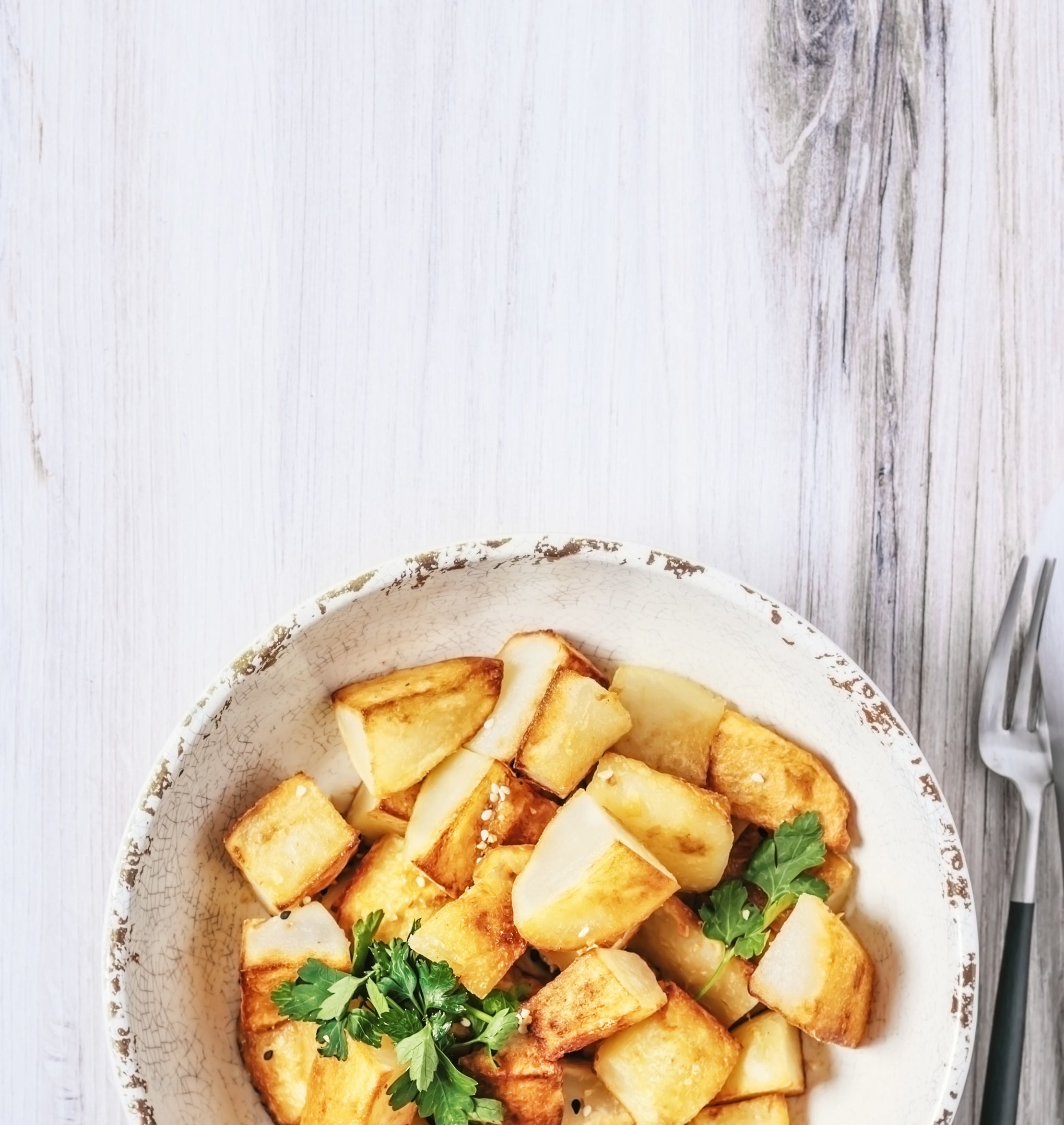 roasted potatoes in a serving bowl