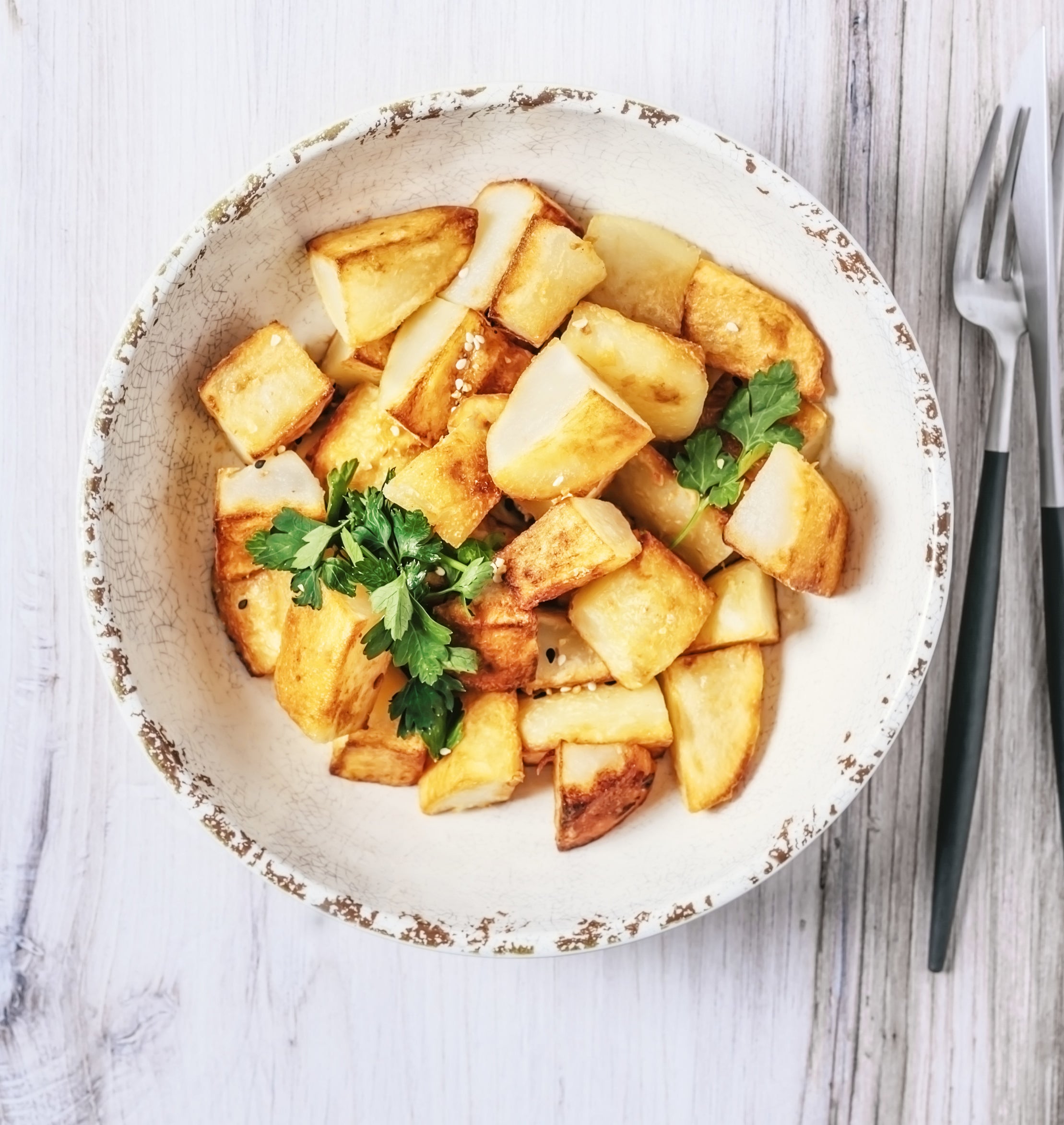 roasted potatoes in a serving bowl