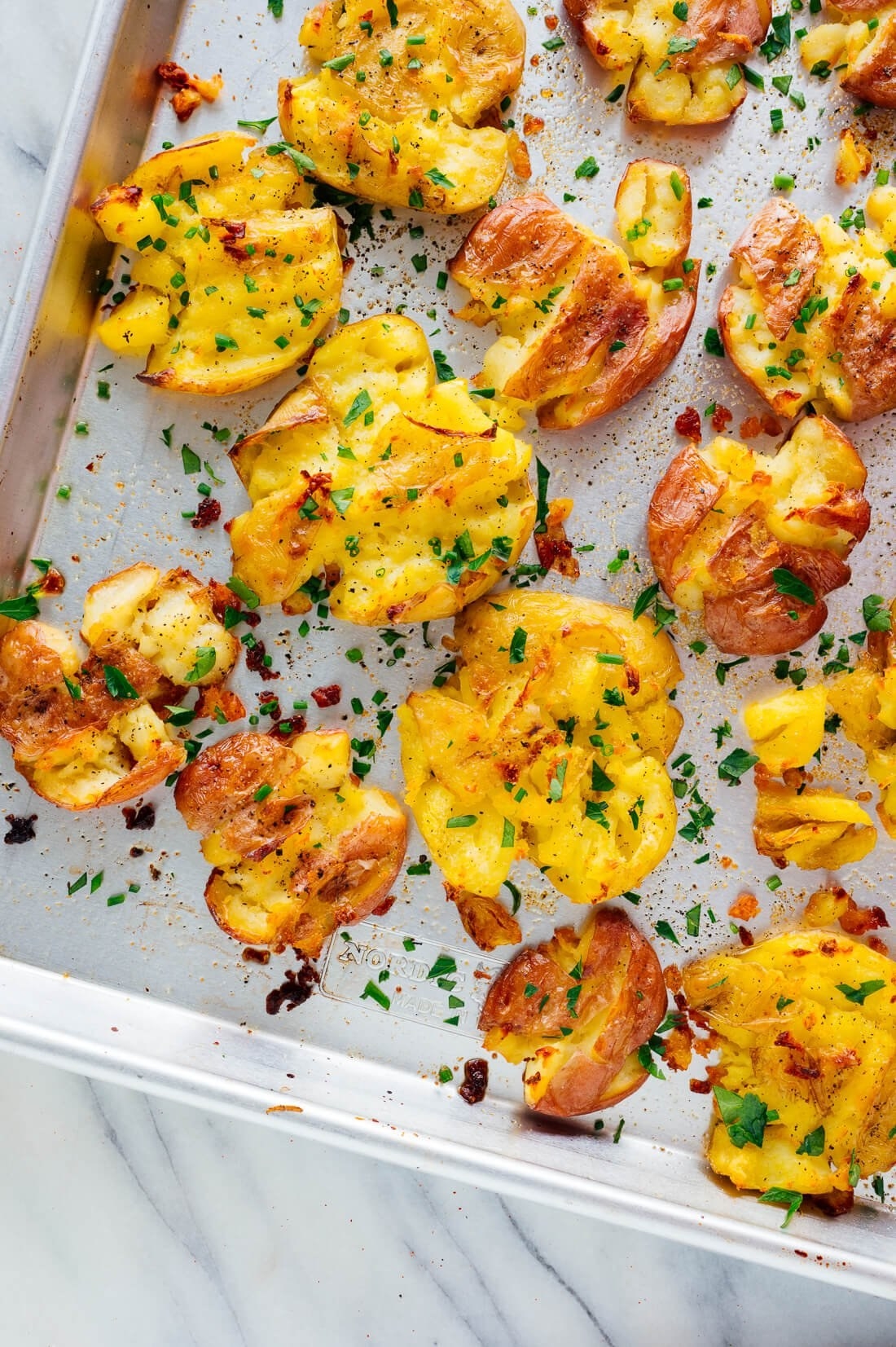 Smashed potatoes on a sheet pan