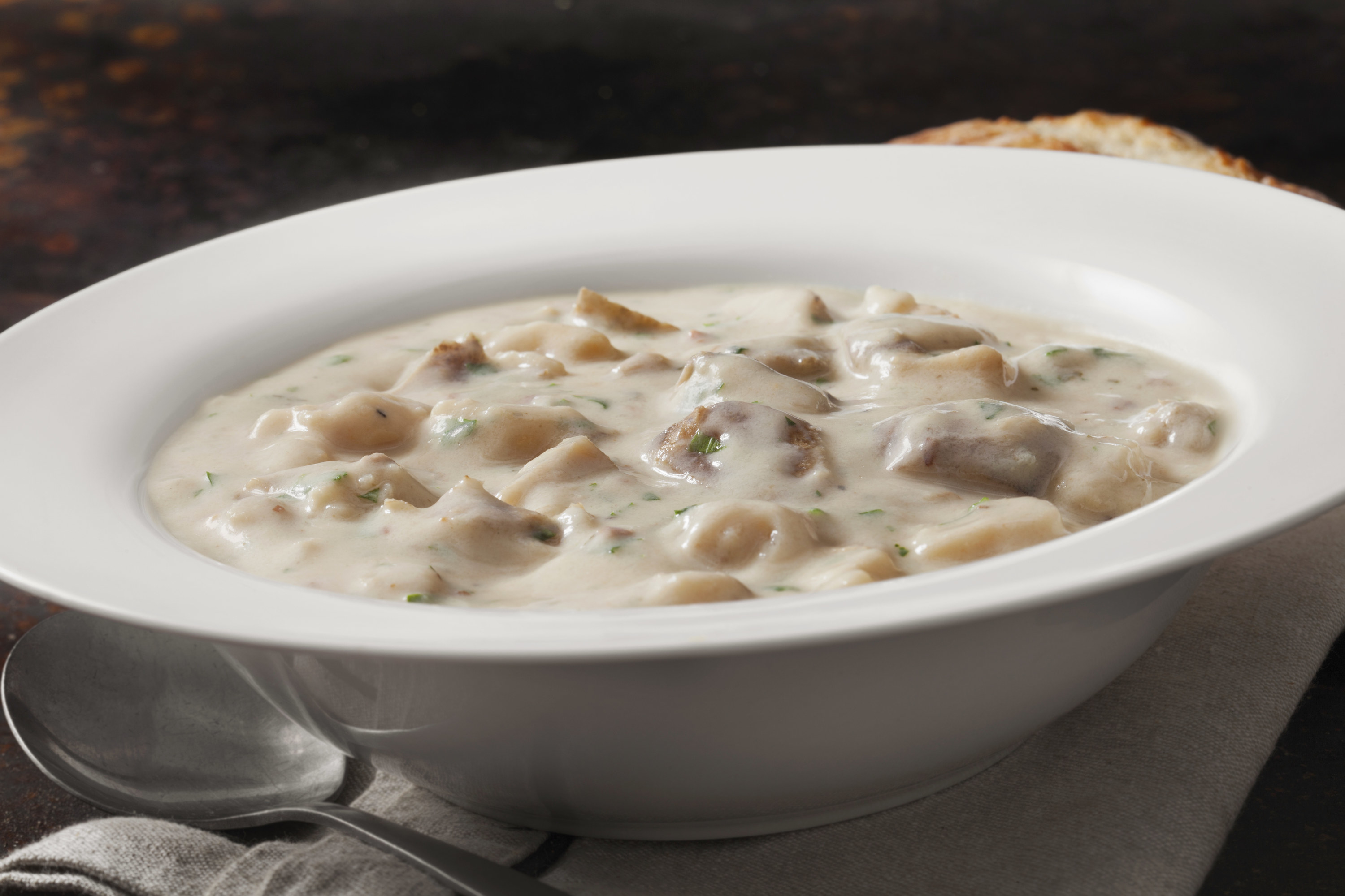 baked potato soup in a white bowl