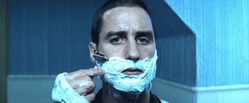 A man shaving his face