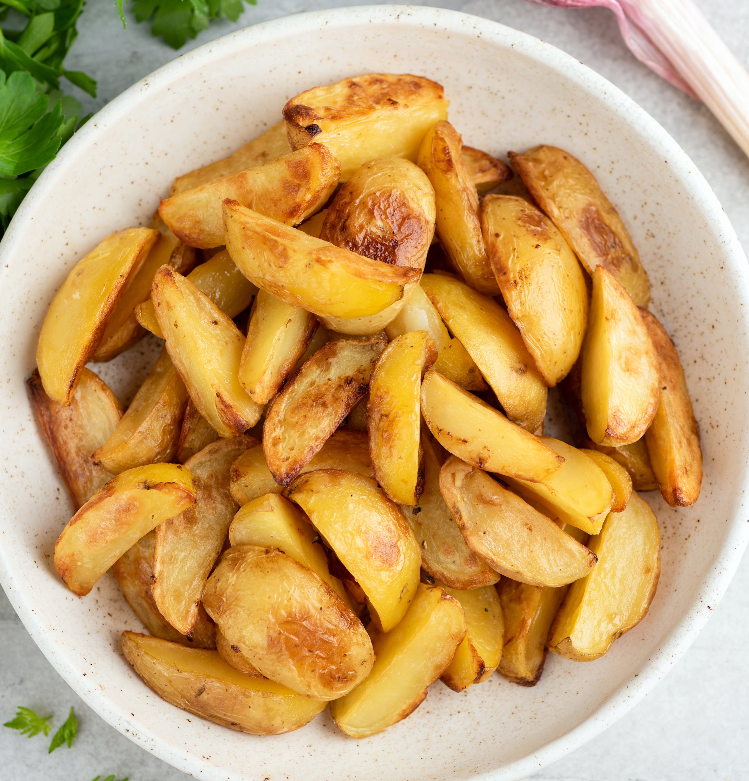 baked potato wedges in a serving bowl
