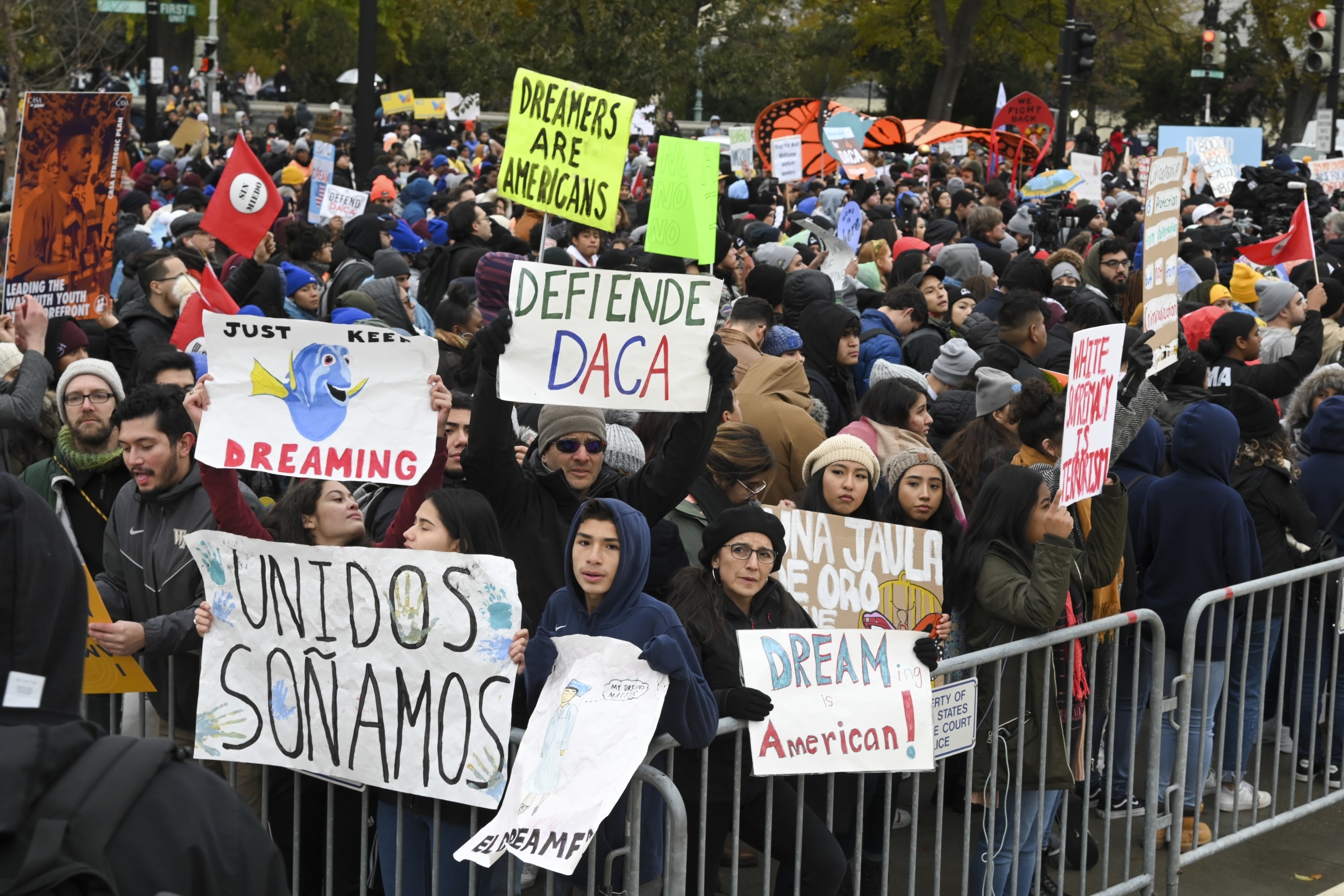 People demonstrating in support of DACA recipients staying in America