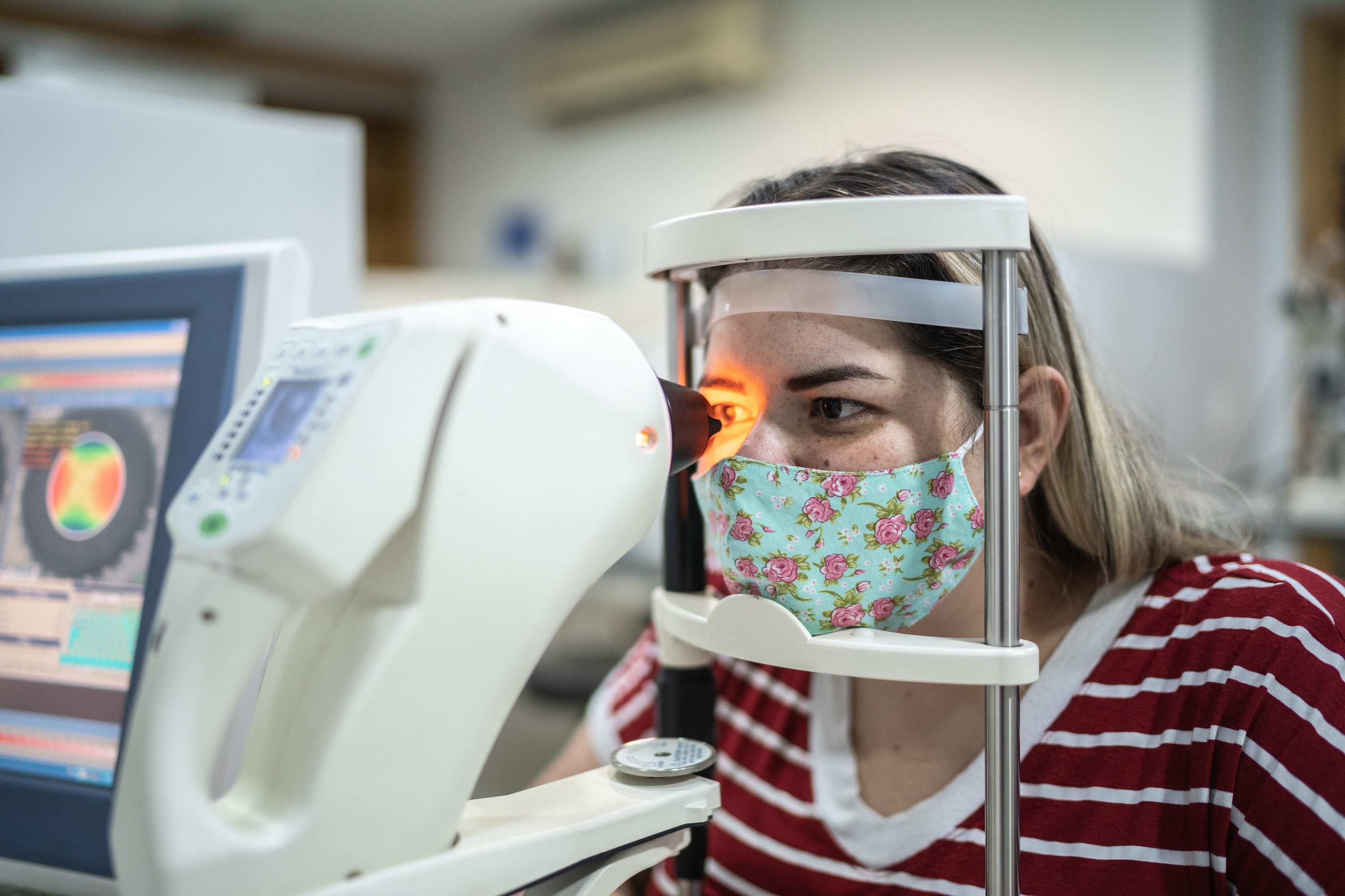 Woman getting her eyes examined