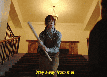 gif from the shining  – woman waving a bat yelling &quot;stay away from me&quot;