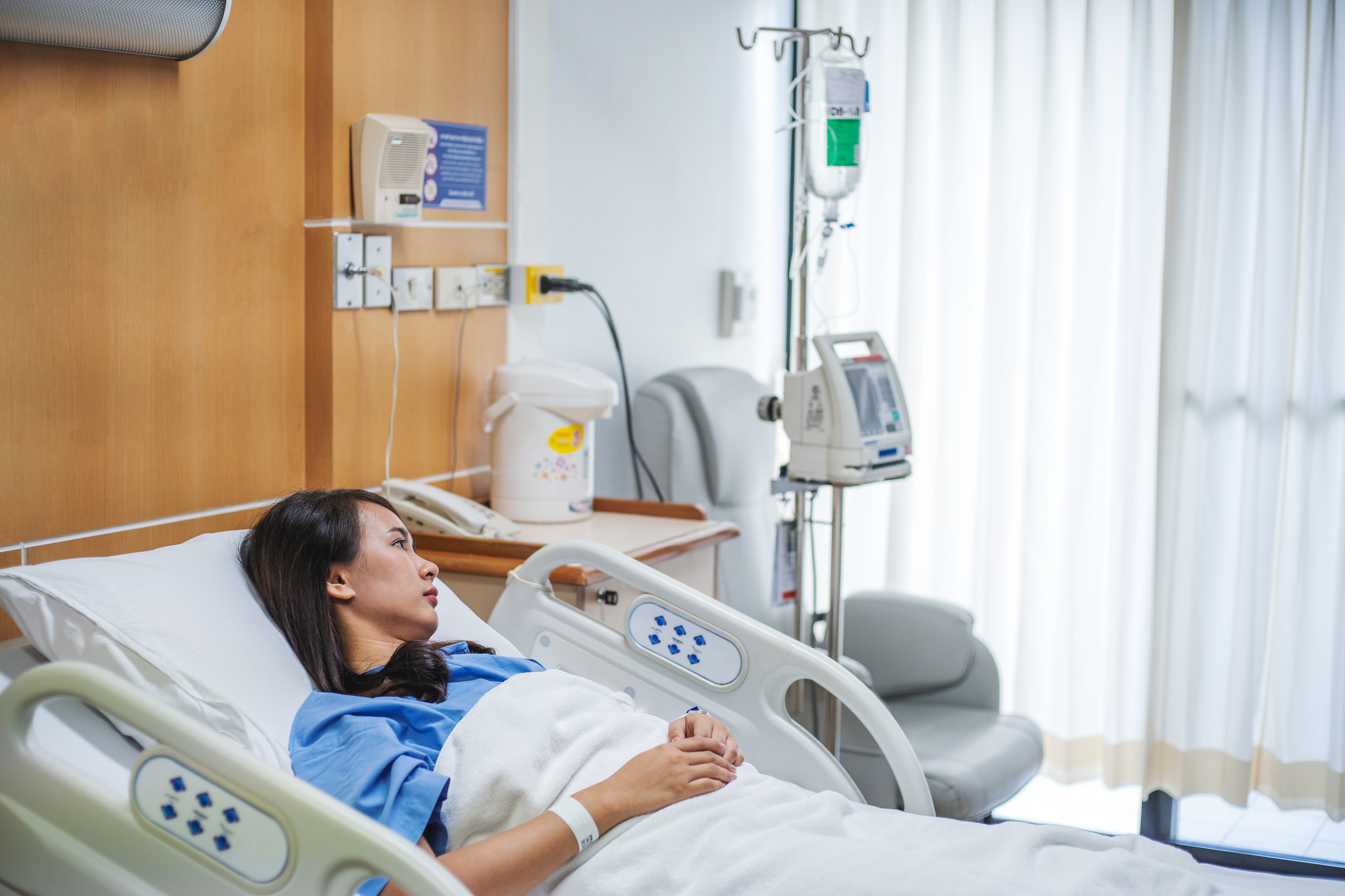 Woman laying in a hospital bed