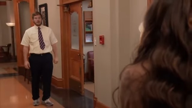 Andy talking to Leslie in the hall in &quot;Parks and Recreation&quot;