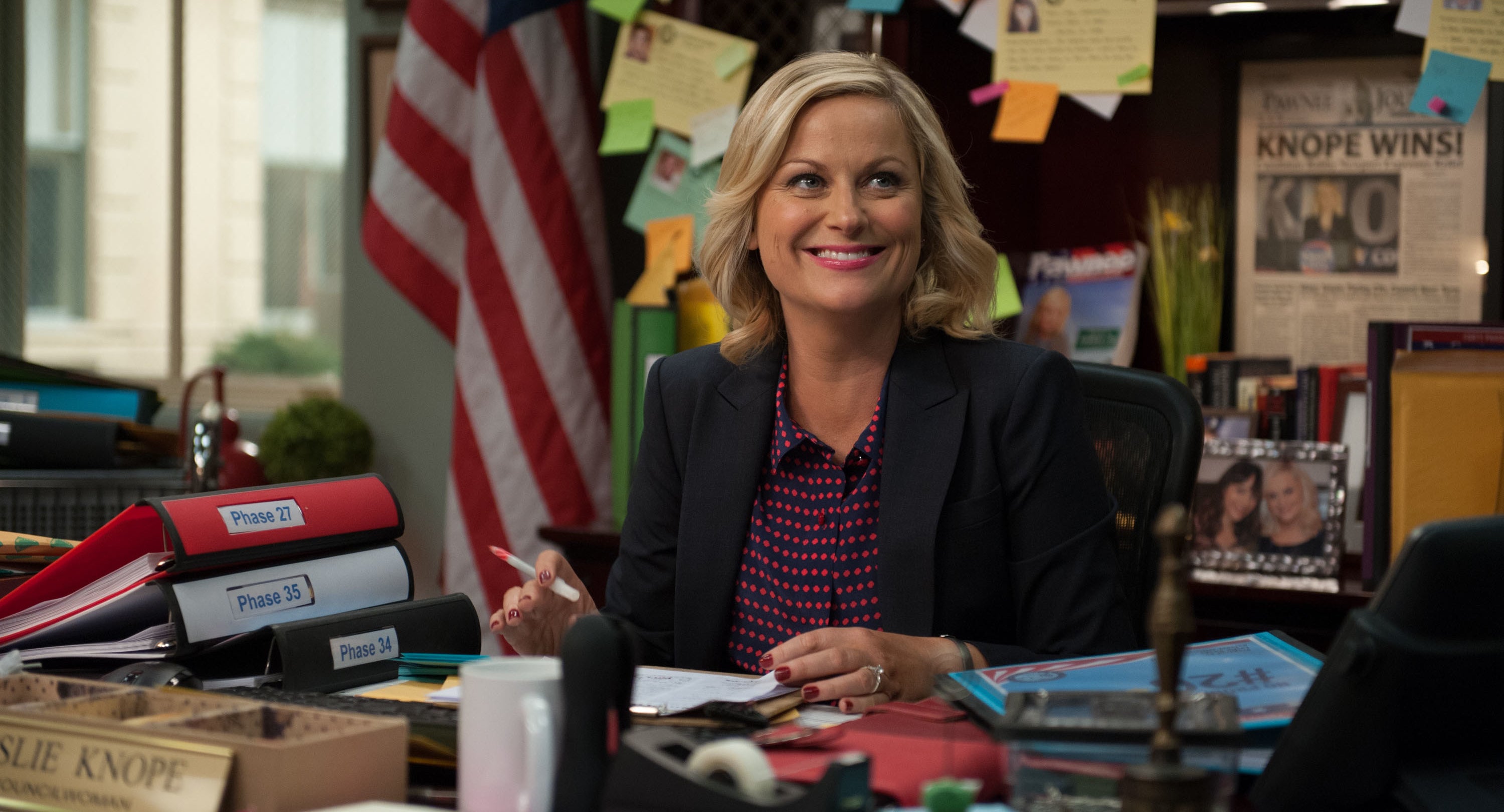 Leslie sitting at her desk in &quot;Parks and Recreation&quot;