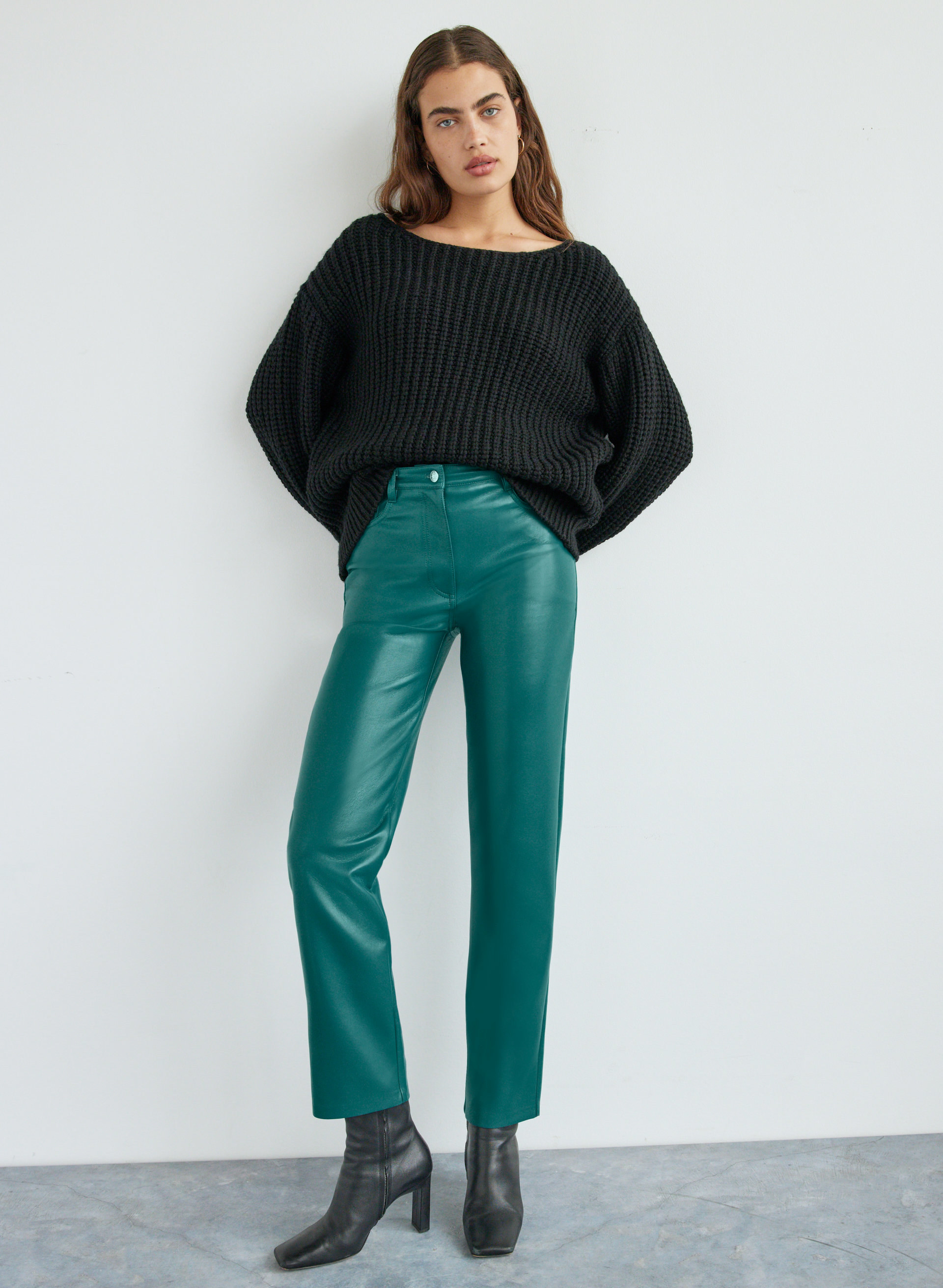 model wearing green pants