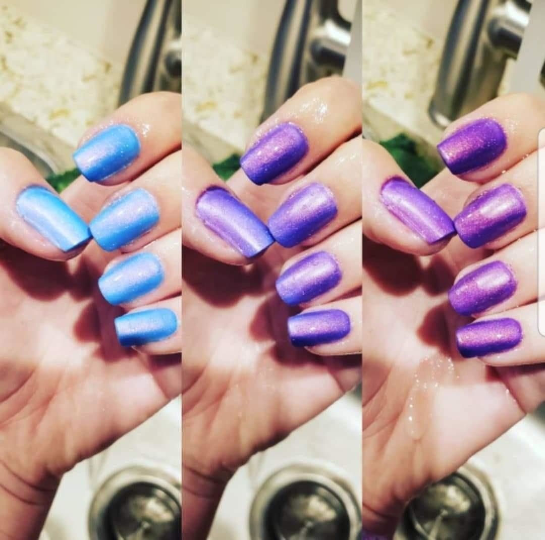 reviewer&#x27;s nails sparkly teal, then changing to purple, then purple