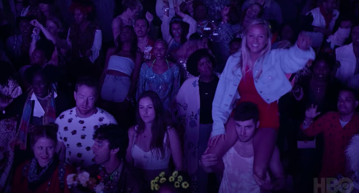 A crowd of people at Coachella in a scene from Insecure